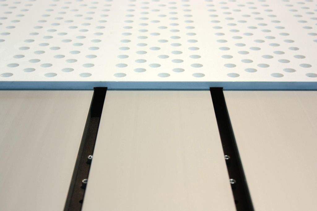 Each table slat acts as a linear vacuum channel